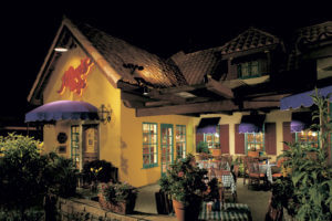 Mimi's Cafe exterior at night