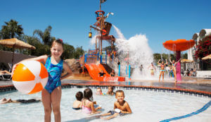 Howard Johnson Anaheim hotel Castaway Cove rain tree and toddler pool