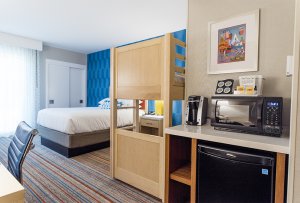 hotel room and kitchenette at Howard Johnson Anaheim Hotel