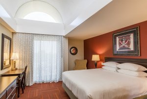 Disney themed king bed hotel room at Howard Johnson Anaheim