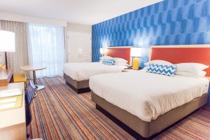 a hotel room with two beds at Howard Johnson Anaheim