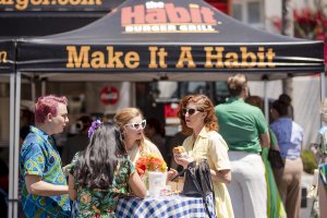 Howard Johnson Anaheim's retro friends eating Habit Burger Grill burgers