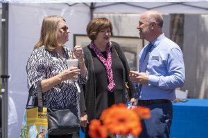 Bill Cleaver talks with guests at the Howard Johnson Anaheim retro re-do