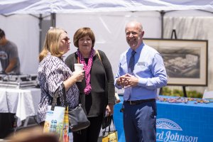 Bill Cleaver talks with guests at the Howard Johnson Anaheim retro re-do