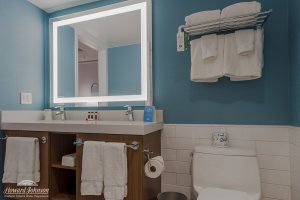 a bathroom suite inside a hotel room at Howard Johnson Anaheim