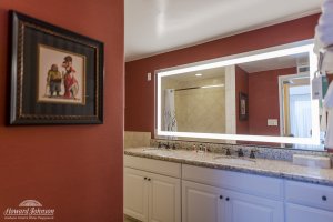 a hotel room bathroom sink at Howard Johnson Anaheim