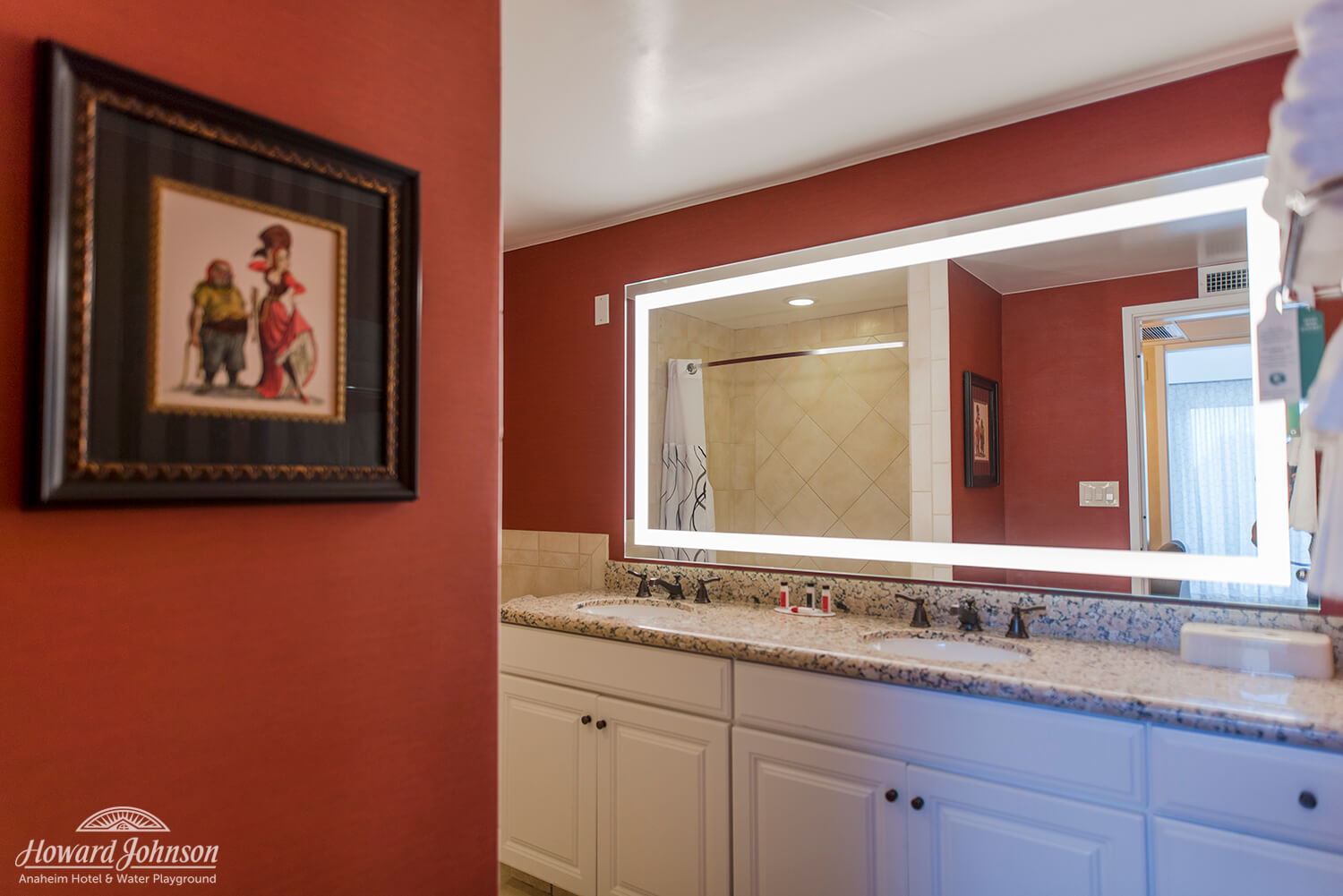 a hotel room bathroom sink at Howard Johnson Anaheim