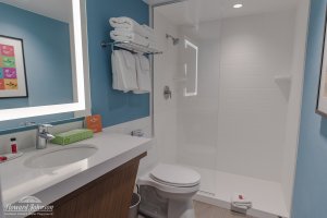 the bathroom inside a hotel suite room at Howard Johnson Anaheim