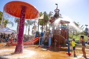 a wide shot of children playing at the Castaway Cove water park
