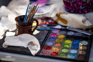 face paints and brushes on a table