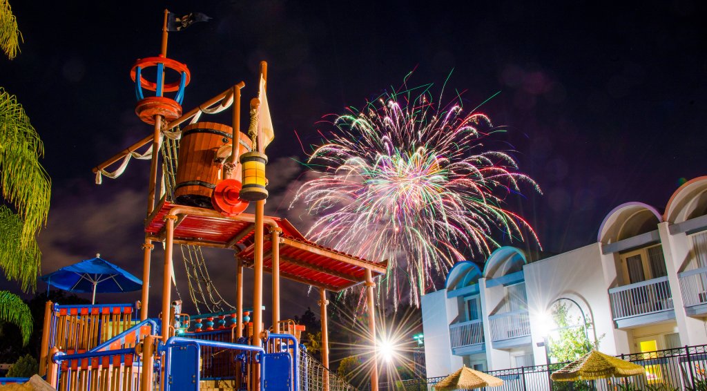 fireworks explode over the water park at Howard Johnson Anaheim