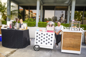 three food concession booths pictured outside Howard Johnson Anaheim hotel for beverages, cotton candy and churros