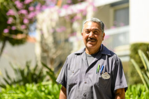 A Howard Johnson Anaheim employee named Jose poses outside the hotel